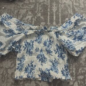 Blue and white off the shoulder ruffled top